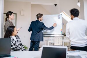 Business team discussing the real cause of a business problem.