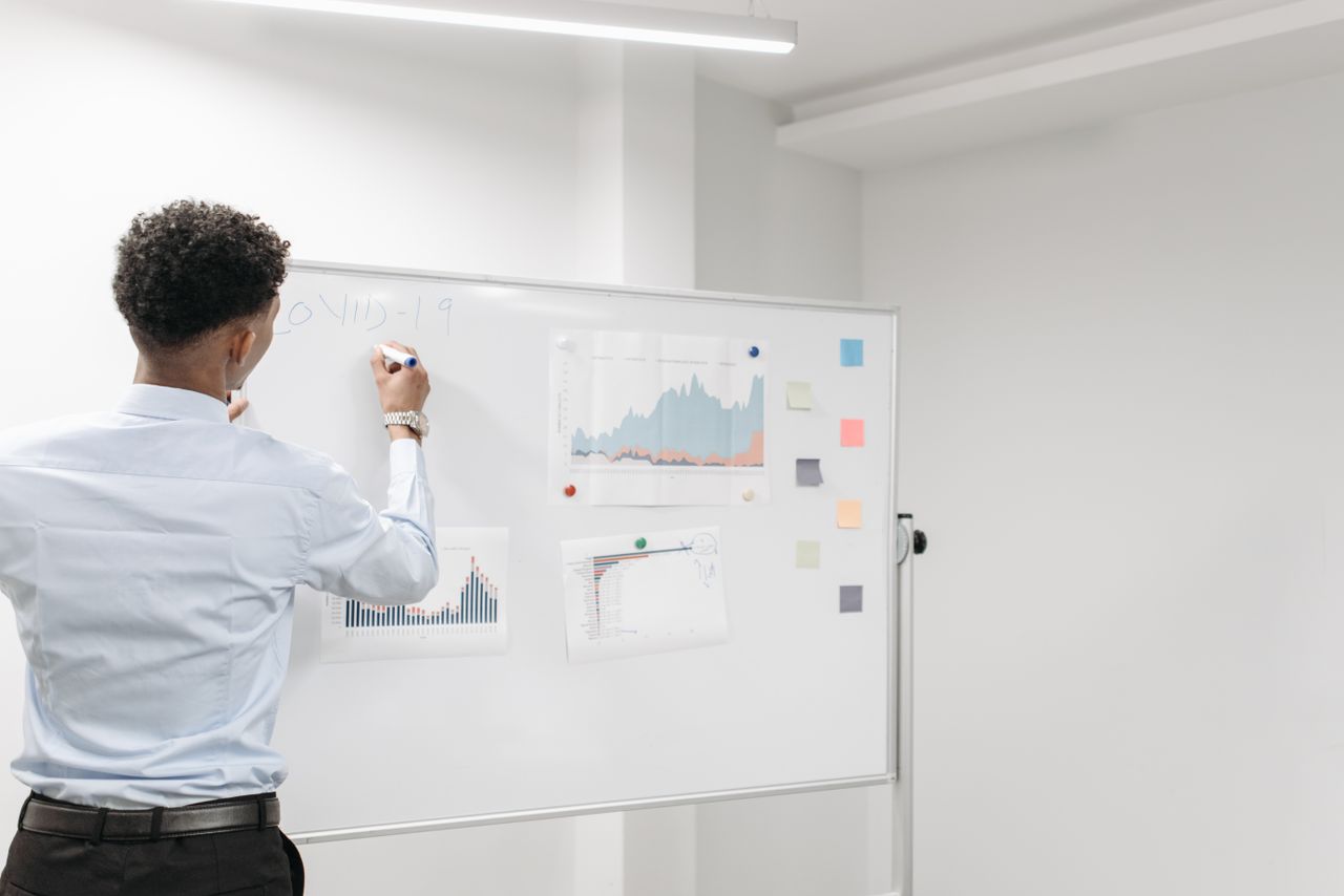 Alt Text Business team discussing a small issue before it becomes a larger problem.